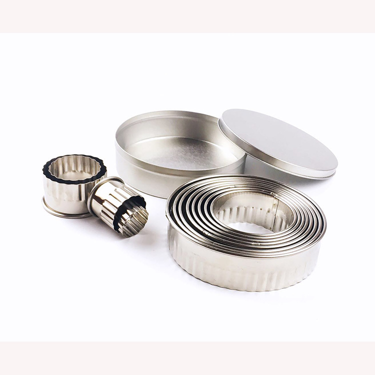 12-piece set of round cookie/cake molds with teeth and dumpling wrapper presser